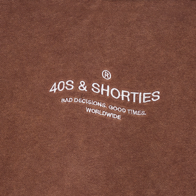 Wavy General Logo Hoodie Coyote – Close-up of front embroidery
