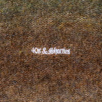 Close-up of chest embroidery detail on the Teen Spirit Sweater – Green
