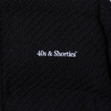 Close-up of the 40s & Shorties chest logo embroidery