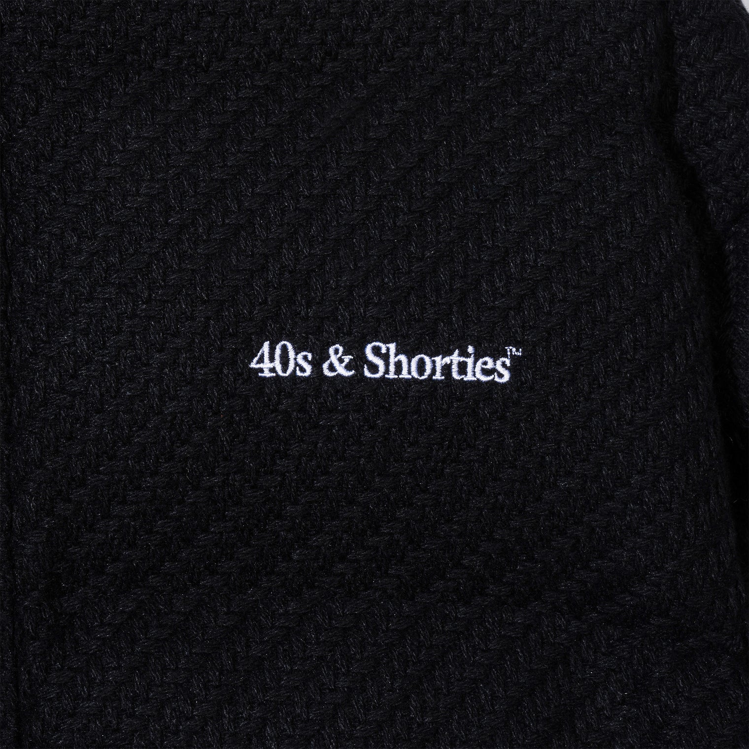 Close-up of the 40s & Shorties chest logo embroidery