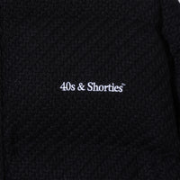 Close-up of the 40s & Shorties chest logo embroidery