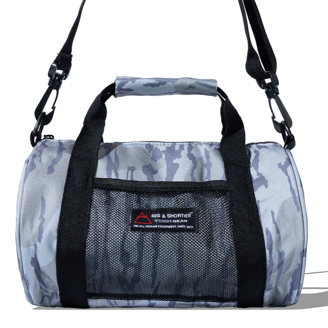 Close-up of Camo Mini Duffle Bag showing mesh pocket and 40s & Shorties branding

