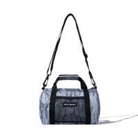 Camo Mini Duffle Bag with alternative woven patch branding and front mesh pocket
