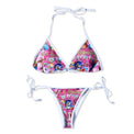 Flat lay of full Holy Spirit Bikini set in pink with printed top and bottom

