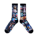 Black crew socks featuring full digital print of religious imagery and embroidered logo near cuff.