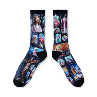Side-by-side view of socks showing artwork from toe to cuff on both feet.