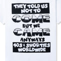 Close-up of back slogan print: "They Told Us Not To Come But We Came Anyways" in black text.
