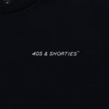 Close-up of the front chest logo reading “40s & Shorties” on black cotton.
