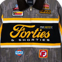 Close-up of front appliqué and detailed embroidery on Camo Garage Jacket
