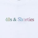 Close-up of multicolor rhinestone "40s & Shorties" logo on white tee.
