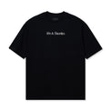 Flat lay of the Text Logo Rhinestone Tee in Black with full crystal rhinestone logo on chest.