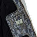 Interior pocket with branded woven label on Treeline Jacket – Camo
