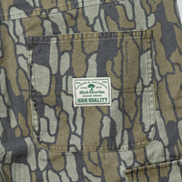 Close-up of back pocket with green 40s & Shorties woven label reading "High Quality"