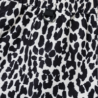 Close-up of elastic waistband with black D-ring on Desert Leopard Shorts
