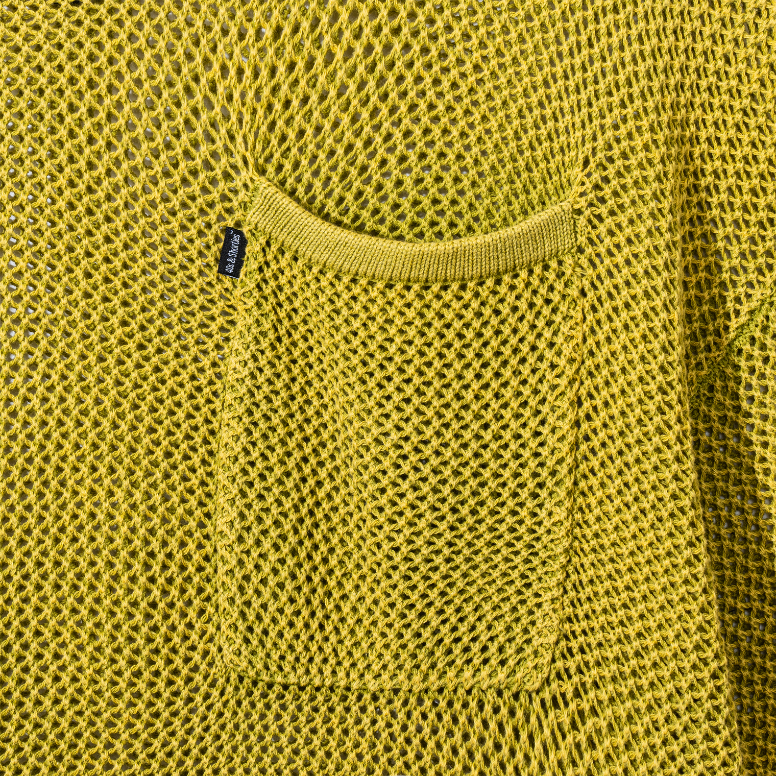 Close-up of chest pocket on Heavy Knit Pocket Tee in Olive
