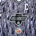 Close-up of 40s & Shorties front chest logo on Champs Hockey Jersey – Camo
