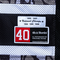 Woven patch detail on the hem of the Champs Hockey Jersey – Camo
