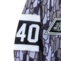 Sleeve number “40” detail on Champs Hockey Jersey – Camo
