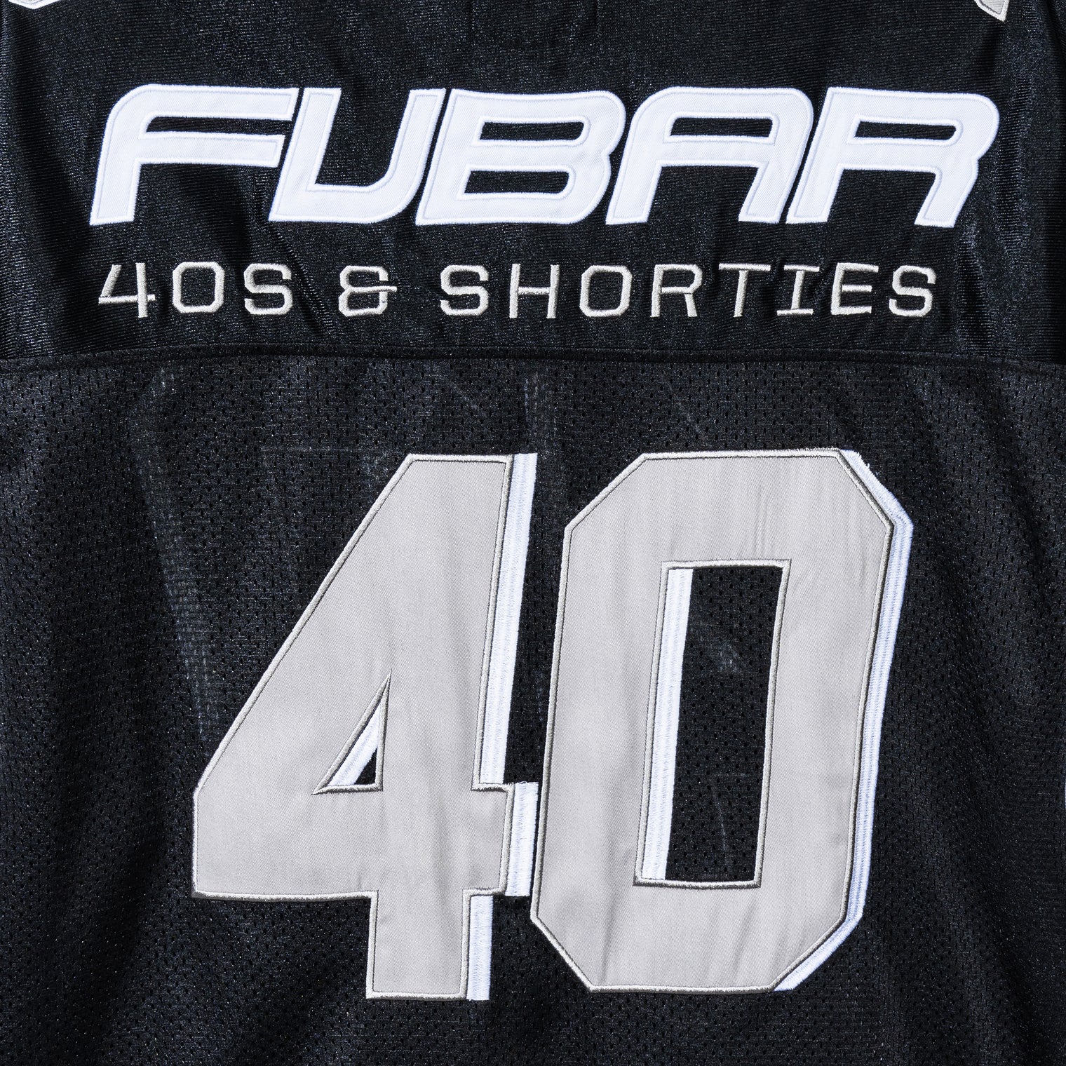 Close-up of the back “FUBAR” and “40s & Shorties” embroidery and appliqué on the Fubar Jersey in Black.

