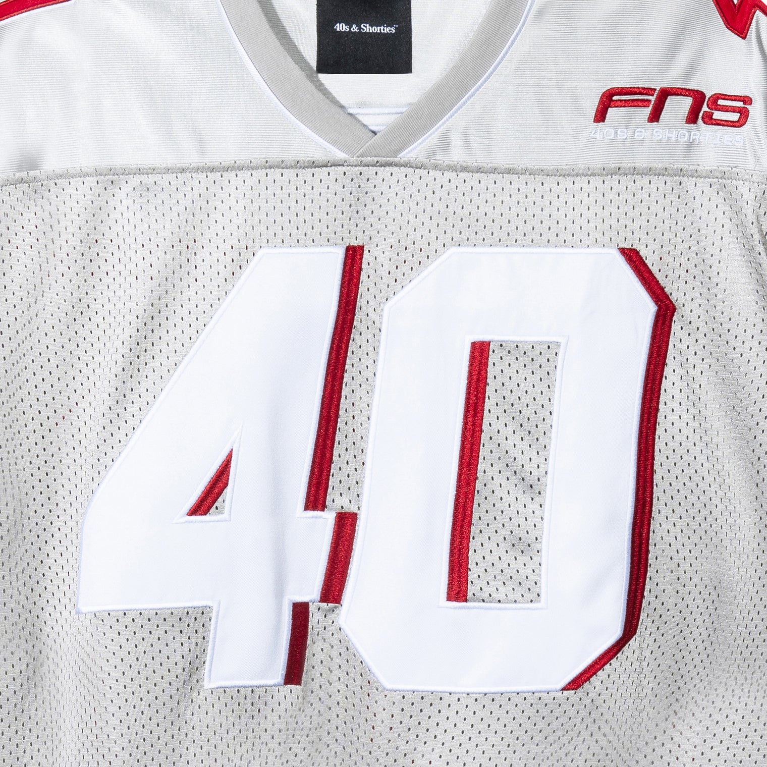Close-up of front “40” appliqué and FNS chest embroidery on the Grey Fubar Jersey by 40s & Shorties.
