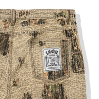 Boro Pants pocket close-up with Leon Thomas x 40s & Shorties woven label and distressed boro stitching
