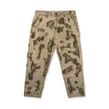 Front view of Boro Pants featuring canvas shell, distressed texture, and printed tree camo under-layer
