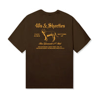 40s & Shorties Fine Garments Tee in Prairie Dust with bold vintage-inspired dog graphic and gothic text print on the back.