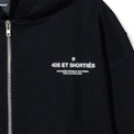 Close-up of front chest graphic reading “40S ET SHORTIÉS” with French text underneath on black hoodie – 40s & Shorties.
