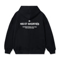 Back view of black French General Zip Hoodie featuring bold white French text across the shoulders – 40s & Shorties.

