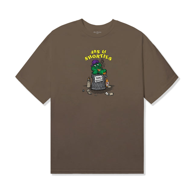 Front view of the Garbage Tee in Prairie Dust by 40s & Shorties featuring a printed cartoon trash can graphic with a green character and “40s & Shorties” text above.