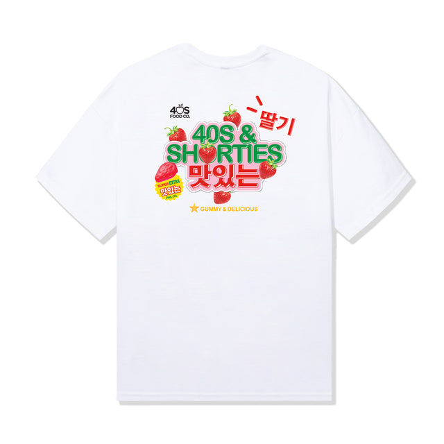Back of white cotton tee with large "40s & Shorties" strawberry graphic and bold Korean characters, inspired by gummy candy packaging.