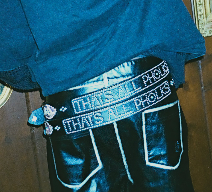 Snakeskin Belt worn with black leather pants, showing ‘THAT’S ALL PHOLKS’ studded lettering and snakeskin side detail