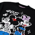 Close-up of cartoon graphic and knit detailing on Toon Town Sweater
