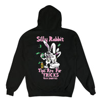 Back of black hoodie featuring cartoon-style bunny duo and bold "Silly Rabbit, Tips Are For Tricks" print.

