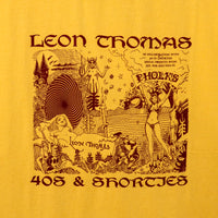 Close-up of Trippy Tee front graphic showing surreal illustration and Leon Thomas x 40s & Shorties branding