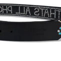 Close-up of embossed 40s & Shorties and Leon Thomas logo on black leather belt with metal stud accents